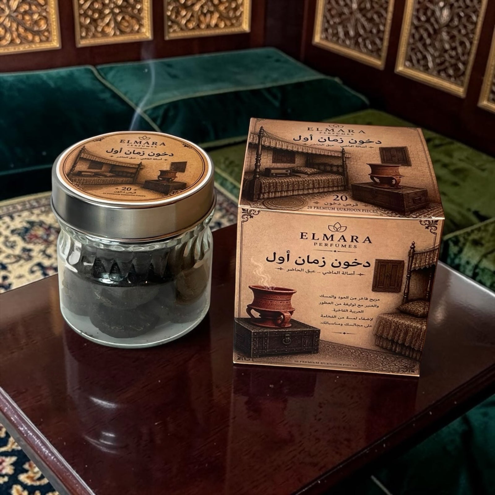 LumaHouse ELMARA PERFUMES Dukhoon incense pieces in a glass jar next to a decorative box on a dark wooden table.