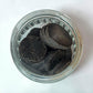 LumaHouse ELMARA PERFUMES premium Dukhoon incense pieces in a glass jar, featuring dark earthy Oud and musk blend.